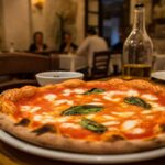 Il conto piccante: quando una spolverata di pepe sulla pizza fa lievitare il prezzo
